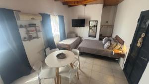 TV a/nebo společenská místnost v ubytování Merlo INK3