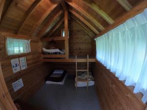 an overhead view of a cabin with a ladder in it at Nikko Manaka Forest Camp & Resort - Vacation STAY 65320v in Nikko