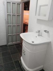 Koupelna v ubytování Village on sea + 32 fotografií