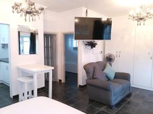 TV a/nebo společenská místnost v ubytování Village on sea