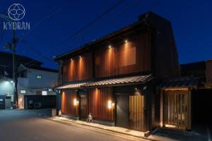 a building with lights on it at night at Jinglan Nanshan - Vacation STAY 65363v in Kyōto