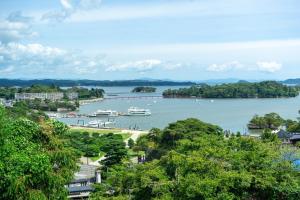 a view of a river with boats in the water at Tabinoteitaku BREATHTAKEMatsushima - Vacation STAY 66188v in Takagi