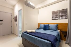 Postel nebo postele na pokoji v ubytování Essential Brooklyn - Stúdio com varanda e academia - By Easy Stay + 123 fotografií