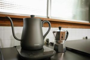 a coffee maker and a blender sitting on a counter at Base House Kinosaki - Vacation STAY 68122v in Tsuiyama +43 photos