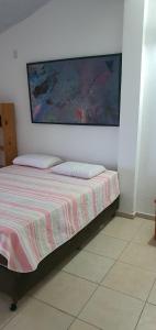 Ένα ή περισσότερα κρεβάτια σε δωμάτιο στο Linda casa