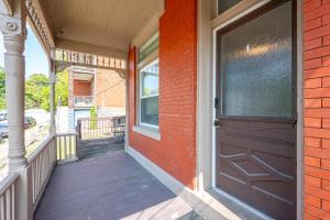 a front door of a house with a porch at Queen City Suites 1 - For 3 in Cincinnati +21 photos