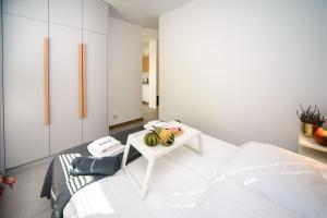 Кровать или кровати в номере Maya's Flats & Resorts 103 - Brzeźno Plaża