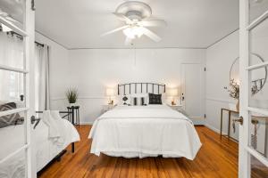 En eller flere senge i et værelse på Belle Caruso