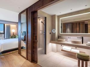 Voodi või voodid majutusasutuse Swissôtel Tbilisi toas