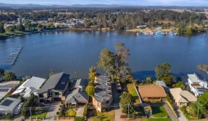 an aerial view of houses on the shore of a lake at Young unit4 On the Lake in Nagambie