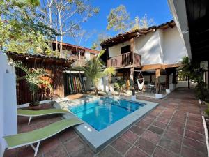 Swimmingpoolen hos eller tæt på La Buena vida Cabina 2