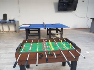 a ping pong table with a ping pong ball at Bm-4 room near the sea with air conditioning and WIFI in Cartagena de Indias +3 photos