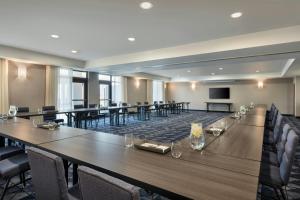a large conference room with a long table and chairs at Courtyard Casper in Casper +54 photos