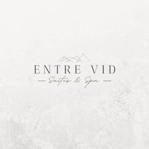 a sign that reads entire vhd surfer and spa at ENTREVID suites & spa in Anchoris