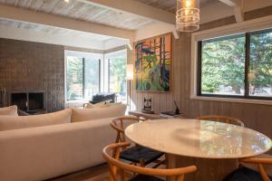 a living room with a couch and a table at Villager Condo 1240 in Sun Valley