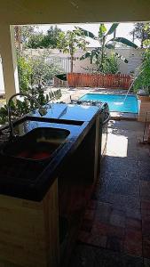 Bazén v ubytování Casa de eventos Andreia Borges nebo v jeho okolí