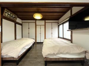 Postel nebo postele na pokoji v ubytování My STAGE