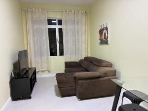 Posezení v ubytování Aptos completos com localização privilegiada no coração de Floripa – CSNs