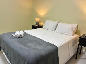 Postel nebo postele na pokoji v ubytování Aptos completos com localização privilegiada no coração de Floripa – CSNs