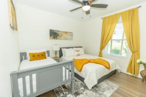 Ένα ή περισσότερα κρεβάτια σε δωμάτιο στο Lake Marlin Villa