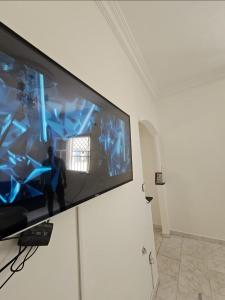 TV a/nebo společenská místnost v ubytování APPARTEMENT Blue