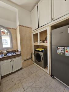 Kuchyň nebo kuchyňský kout v ubytování APPARTEMENT Blue