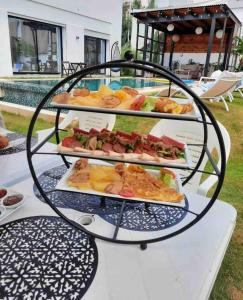 a tray of food on a table with food on it at Dar Aissa in El Maamoura