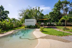Bazén v ubytování Villavida Boutique Hotel - La Playita nebo v jeho okolí