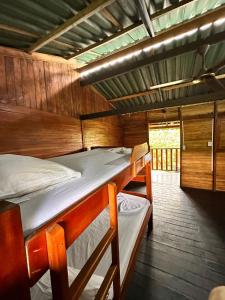 a bedroom with two bunk beds in a boat at Casa Cachalote in El Valle