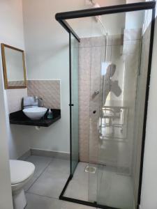 Koupelna v ubytování Flat 01 - Zona Sul Prox UMC, Praia Clube, Shopping e Pátio Vinhedos