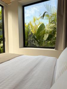 Postel nebo postele na pokoji v ubytování Calalun