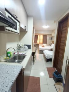 Ένα ή περισσότερα κρεβάτια σε δωμάτιο στο Cheryl studio