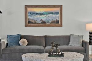 a living room with a couch and a coffee table at La Rinconada Place in Redding +122 photos