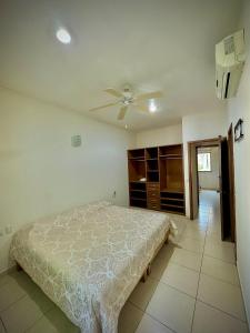 Ένα ή περισσότερα κρεβάτια σε δωμάτιο στο Depa 101B en Huatulco con alberca y balcón a 5 min playa