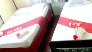 Ένα ή περισσότερα κρεβάτια σε δωμάτιο στο Ovalau Getaway Resort