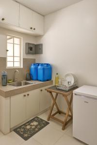 Kuchyň nebo kuchyňský kout v ubytování Islana Stay Rm B for 1pax only