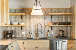 a kitchen with a sink and a counter top at 1 Block from Main St Views Pets Okay in Leadville
