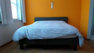 Postel nebo postele na pokoji v ubytování Holiday Home Goesting