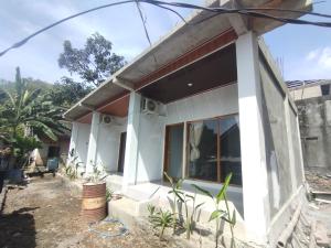 a house with a view of the front of it at Ilham Homestay in Kuta Lombok +7 photos