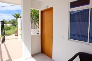 a door to the outside of a house at Habitacion Manglares 101 in Coveñas