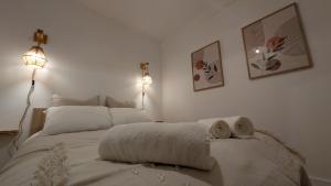 Ένα ή περισσότερα κρεβάτια σε δωμάτιο στο Le Terra Redon - T2 centre ville - 6 min gare - local vélo +11 φωτογραφίες