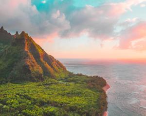 an aerial view of a mountain near the ocean at Island Getaway Camper Cozy Rooftop Tent & Full Gear Kauai in Anahola