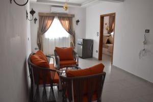 TV a/nebo společenská místnost v ubytování Lake House Hotel