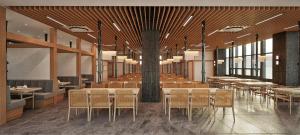 PampangThe First Clark Hotel and Residence的一间有桌椅的餐厅