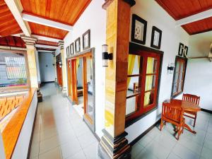 Χώρος καθιστικού στο Soluna Homestay Bali