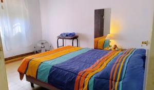 Postel nebo postele na pokoji v ubytování Casa céntrica Yrigoyen