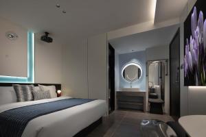 Postel nebo postele na pokoji v ubytování Shanqi · W Hotel (Chongqing Guanyinqiao Street)