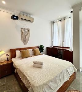 Ένα ή περισσότερα κρεβάτια σε δωμάτιο στο Rù Rì Homestay