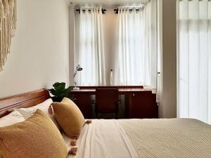 Ένα ή περισσότερα κρεβάτια σε δωμάτιο στο Rù Rì Homestay +7 φωτογραφίες