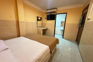 Katil atau katil-katil dalam bilik di 98 Inn BilikXpert at Chow Kit